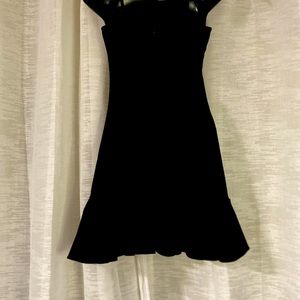 The Little Black Dress with Adjustable Straps is an Eye Catcher. Size 2 NWOT
